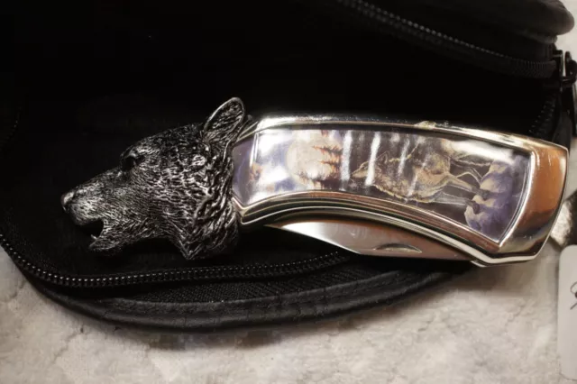 Franklin Mint Timber Wolf Knife, in good condition, Sterling Silver accents