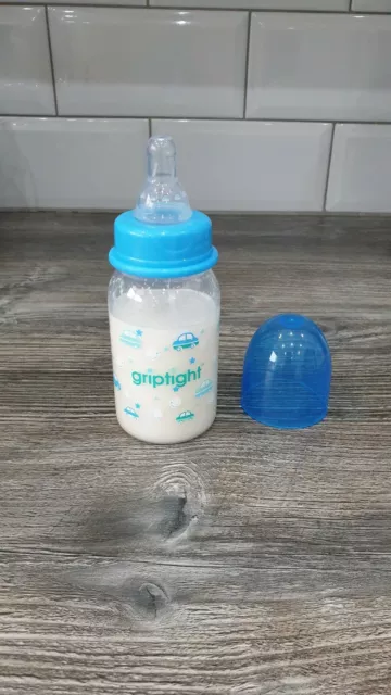 Griptight 4oz Blue Baby Bottle of Fake Milk