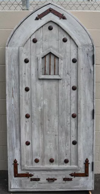 Rustic reclaimed lumber arched top Tudor DOOR speakeasy wrought iron hardware