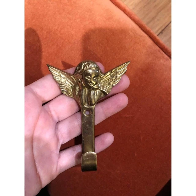 Vintage gold brass ornate cherub hook hanger 3.25 inches tall 2.75 inches wide