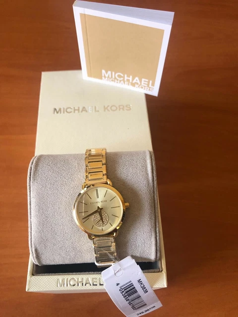 Reloj Michael Kors. Nuevo con etiquetas. Dorado muy elegante. Sin uso.