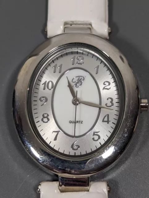 White Silver Tone Dial Oval Case White Faux Leather Band Watch