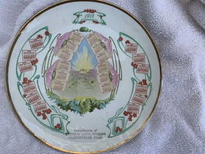 Antique Calendar Plate 1911/1912 Combo Platteville Colorado Druggist