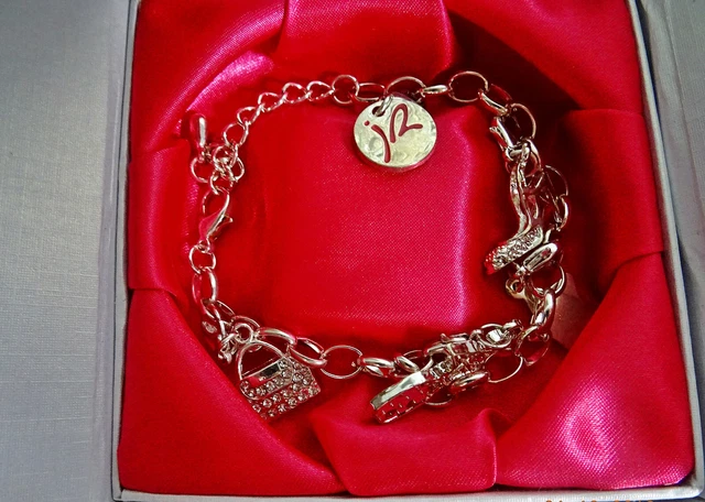 BRACELET ARGENTÉ JACQUELINE RIU avec charms, NEUF dans son écrin