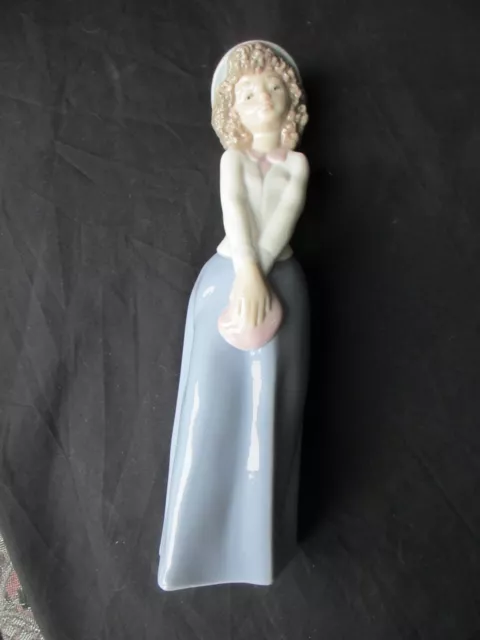 Lladro , nao ,9.5 inch figurine Girl holding purse mint  condition first quality