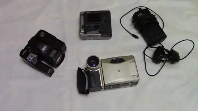 job lot of retro cameras spares and repairs film, video and digital.