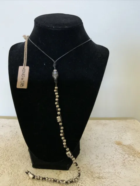 UNO de 50 Swarovski Grey Skull silvertone black leather lariat  necklace