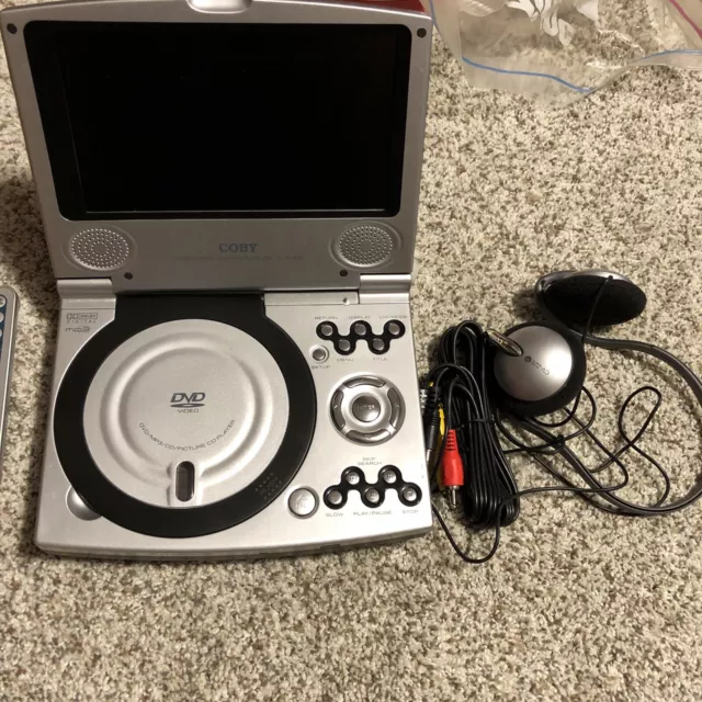 Coby TF-DVD7100 Portable DVD Player (7") Power Cord and remote not included.