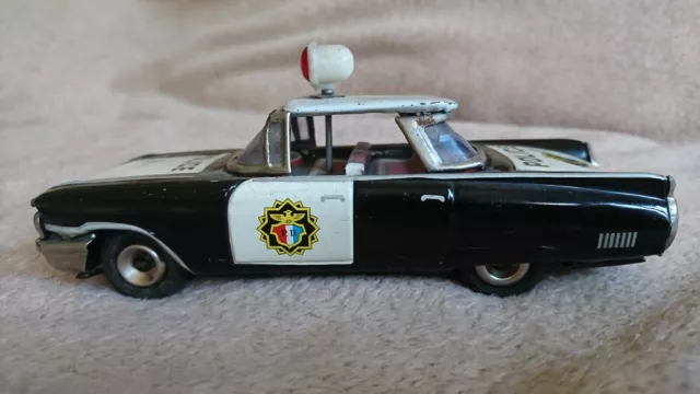 Ichiko Cadillac 1960 Police Blechauto Friktion Japan Blechspielzeug tin toy lata