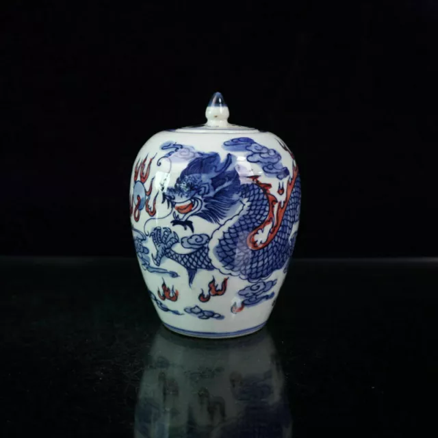 Chinese old porcelain Blue and white glaze in red dragon lid jar Receiving pot