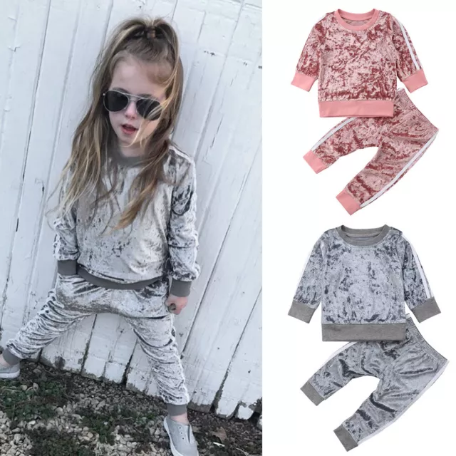 Maglione top pantaloni tuta vestiti
