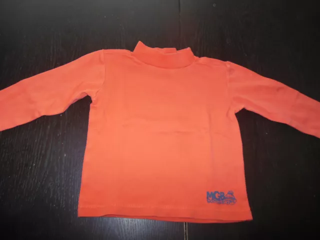 sous-pull orange en coton 4 ans très bon état