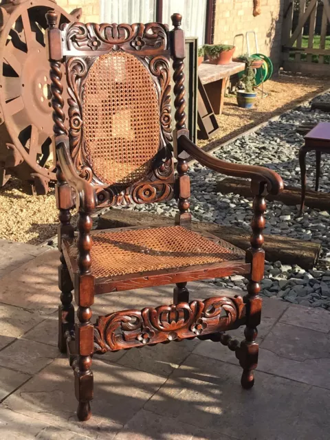 Antique carved Oak Throne Chair cane seat and back