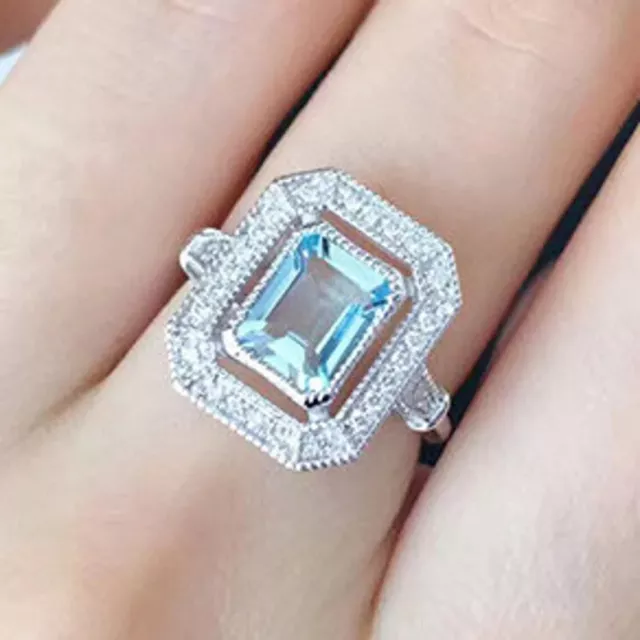2.5CT Emerald Cut Simulated Blue Topaz Halo Engagement Ring 14K White Gold Plate
