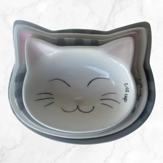 https://www.picclickimg.com/liUAAOSwlJdlYoj1/World-Market-Ceramic-Cat-Face-Shaped-Measuring-Cups.webp
