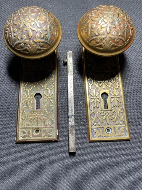 Exquisite Antique Brass Door Knobs (2) and backplates (2).