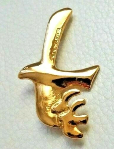 Broche BICHE DE BERE Doré en Métal - 53449748