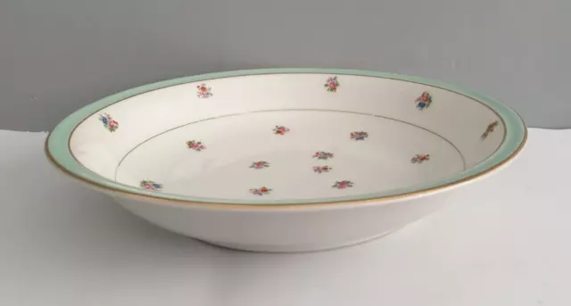 Plat creux  en porcelaine de Limoges décor fleuri