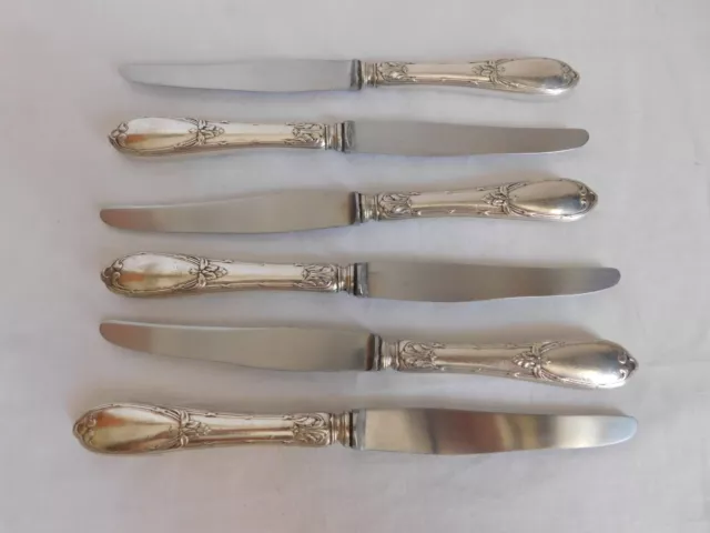 Suite de six couteaux à entremets Louis XV  métal argenté lame inox