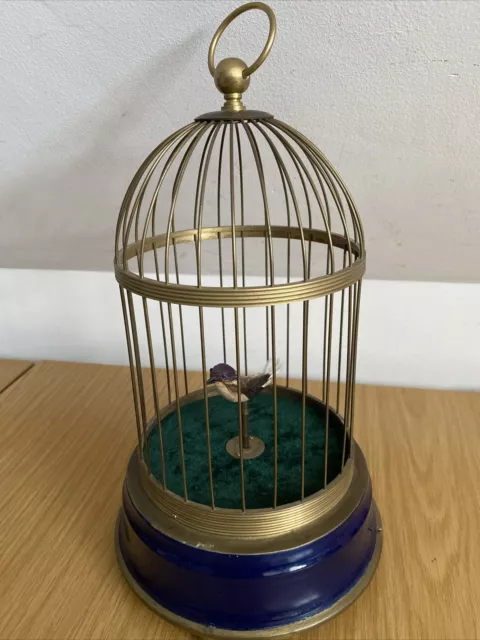 A lovely antique / vintage singing bird in a cage automata