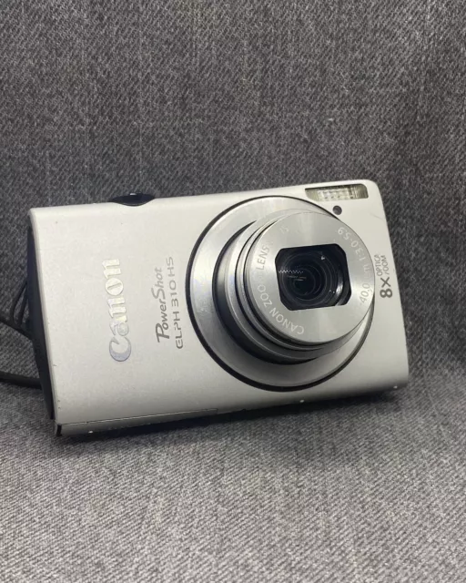 Canon PowerShot ELPH 310 HS ( IXY 600F / IXUS  230 HS ) Digital Camera - Silver