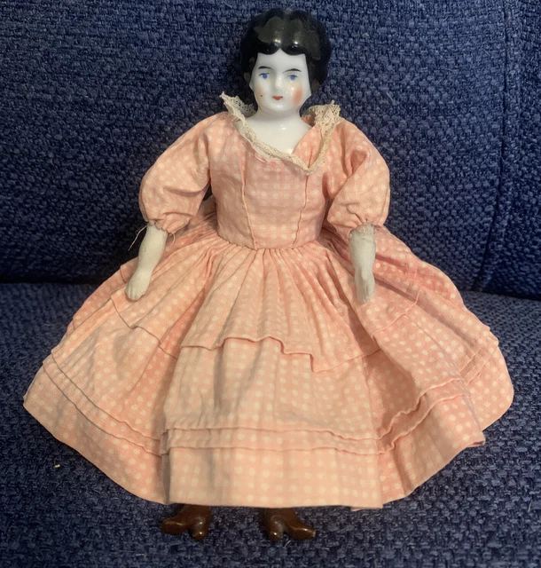 Antique porcelain doll with cloth best sale body