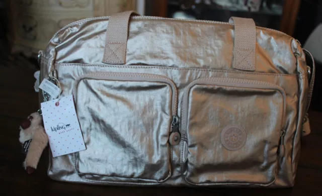 Kipling sparkly gold online