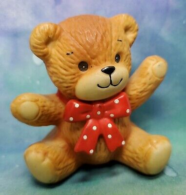 Enesco Lucy and Me Lucy Rigg red bow bear sitting both arms out