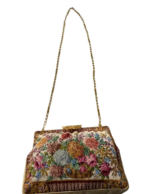 Elegant bag with embroidered flower design