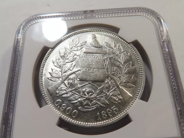 E54 Guatemala 1895 Peso NGC AU-58 2