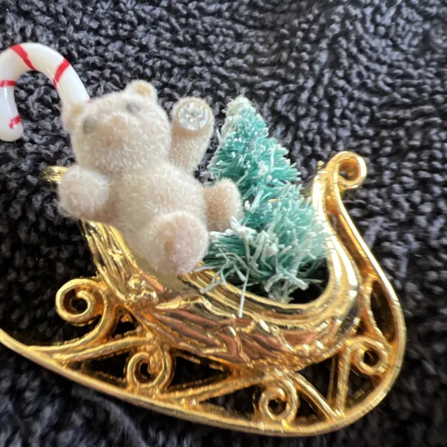 Vintage Gold Tone Christmas Sleigh Carrying Teddy Bear, Tree, & Candy Cane.