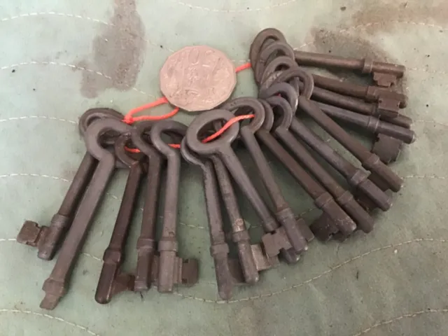 Vintage large group of lock keys of similar size and make