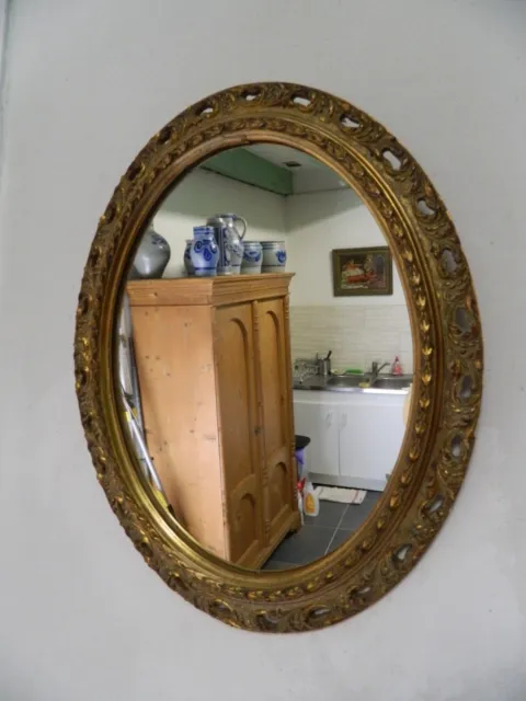 Miroir ovale, doré, 20ème