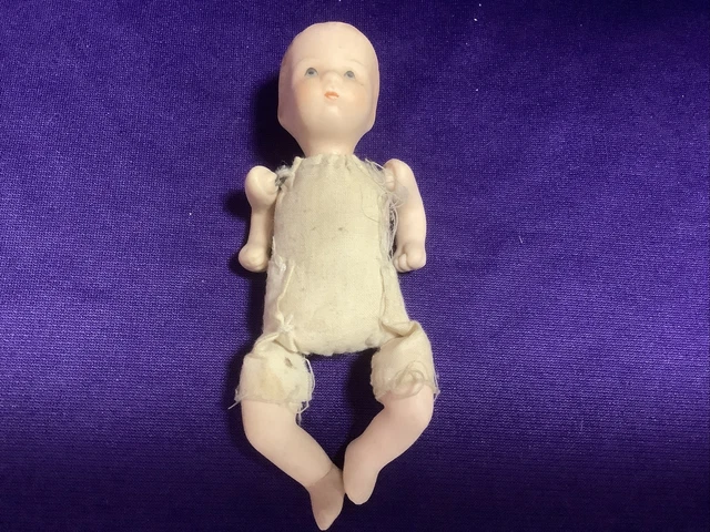 Unbranded Doll. 4.5 In Tall. Bisque Head Cloth Body, Strung. Caracul Hair. (010)