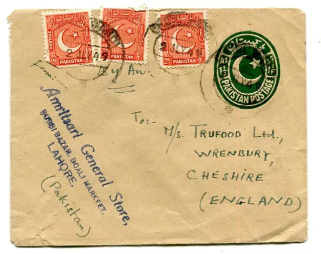 Pakistan 1949 “1½ As.” green embossed Envelope uprated + 2as. x6 “LAHORE” to UK