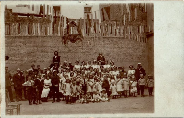 Women in Nursing Uniforms, Many Children, Men in Military Uniforms RPPC Postcard