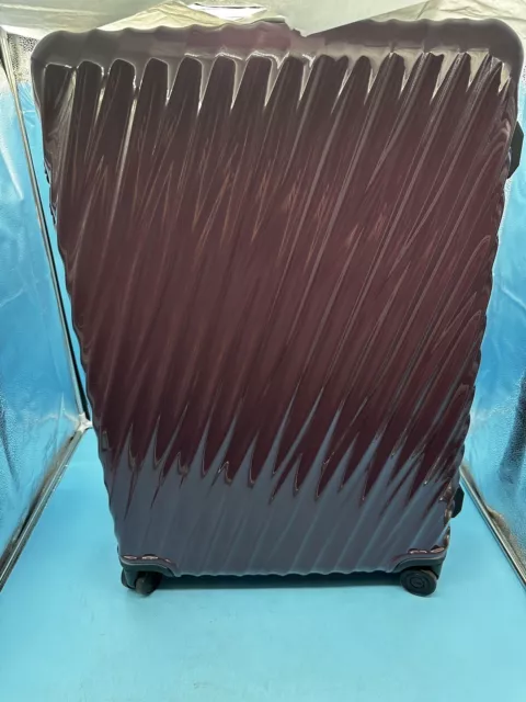 Tumi Extended Trip expandable 4 wheeled packing case Purple