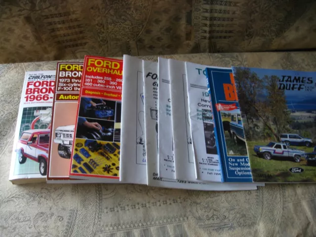 Lot of Ford & Bronco Repair & Tune-Up manuals & parts books, magazines + poster