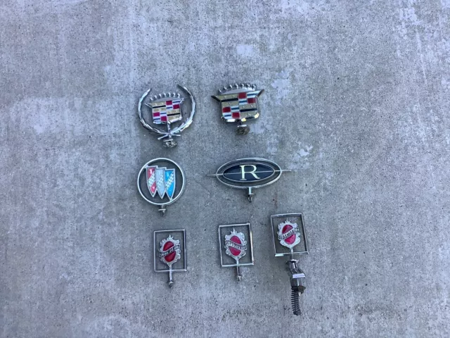 1980’s, 1990’s, Cadillac, Buick, Oldsmobile, Cutlass Hood Emblems. Lot Of 7. 1980’s, 1990’s, Cadillac, Buick, Oldsmobile, Cutlass Hood Emblems. Lot Of 7.