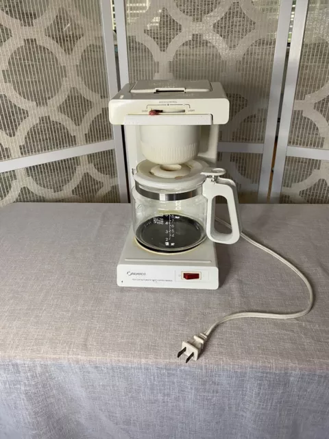 https://www.picclickimg.com/lxAAAOSwfcNk9PnH/Vintage-Norelco-CT-162-10-Cup-Automatic-Drip-Coffee.webp