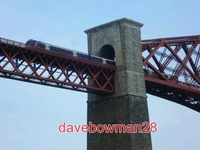 Photo  Train Crossing The Forth Bridge Passing Through The Viaduct Arch At North