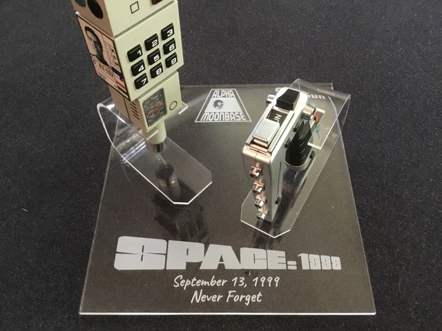 Space 1999 Commlock and Stun Gun Display Stand With Deluxe Supports Space 1999 Commlock and Stun Gun Display Stand With Deluxe Supports