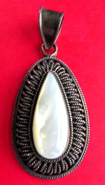 Mother Of Pearl Tear Drop Stone In Silver Oval Pendant Filigree