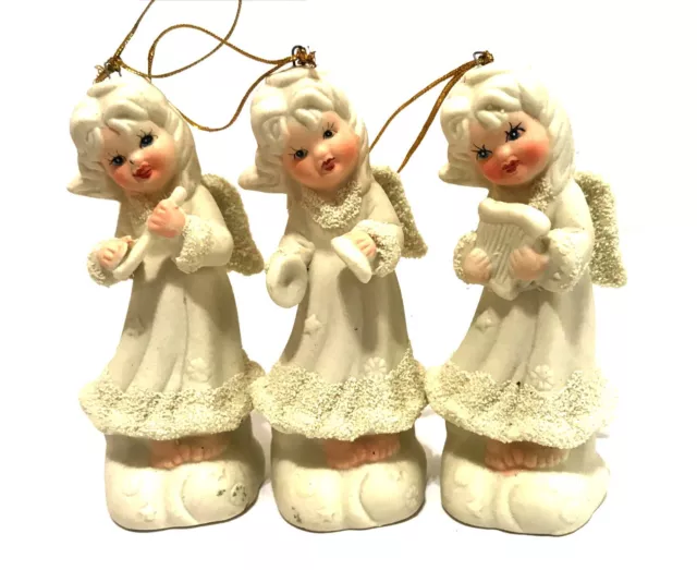 Beautiful Set Of 3 Porcelain Bisque Vintage Angel Ornaments Holding Instruments