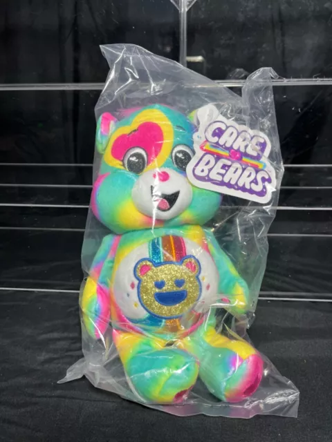 Care Bears, Basic Fun, Glitter Good Vibes Bear, 9” Plush, Go Green, 2024.