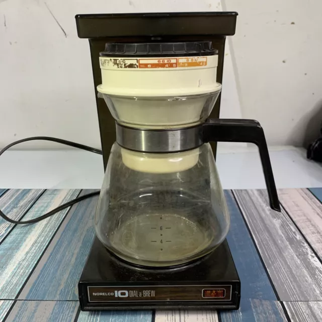 https://www.picclickimg.com/m-IAAOSwA7NknOiG/Vintge-Norelco-10-Dial-A-Brew-Starter-10-Cup-Auto.webp