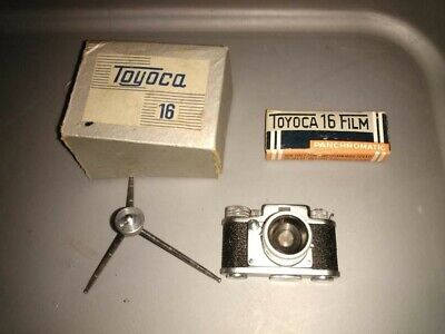Mini cámara espía vintage con caja de película