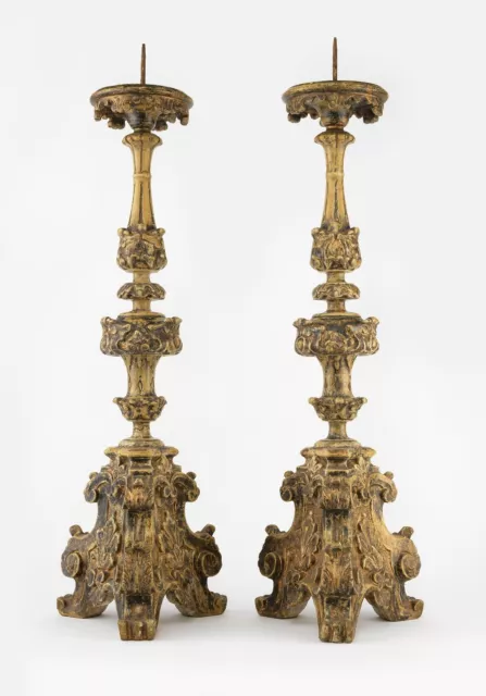 A pair of early 18th century style wood and plaster Italian candelabras