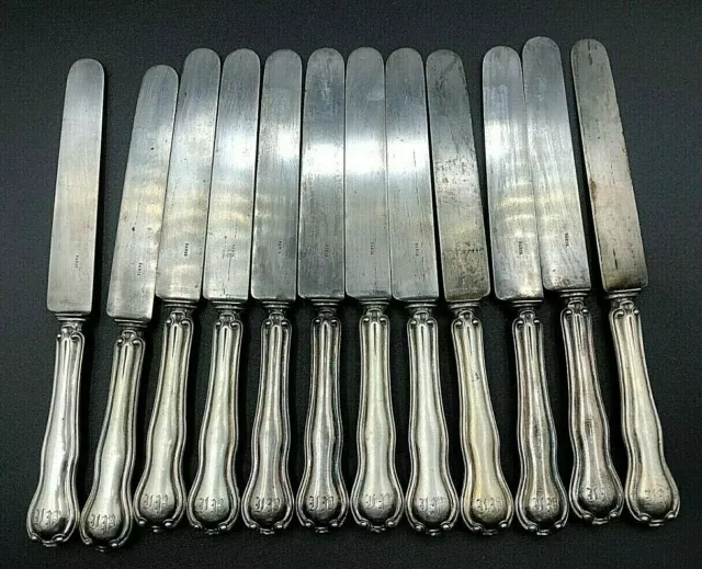 couverts 12 grands couteaux de table  argent minerve louis xv" prudent quitte "