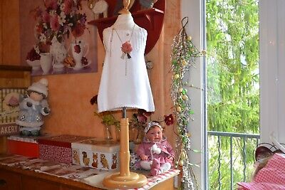 Dior robe baby dior 12 mois etat neuf etat parfait rose poudre poches 
